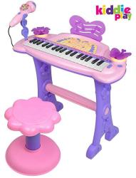 pink toy piano with microphone