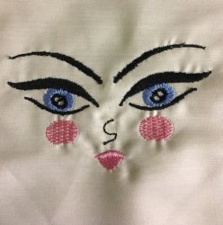 Embroidered Doll Face
