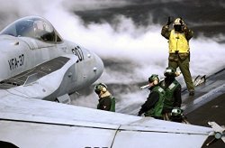 Home Comforts Laminated Poster Flight Deck Sailors Position An F-18 Hornet In Preparation For Launch. Uss Harry S. Truman Cvn 75