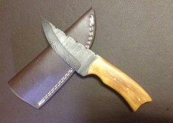 Damascus Steel Biltong Knife. Brass bone wood Leather Sheath. Was R 1950.00. Now Only R899.00